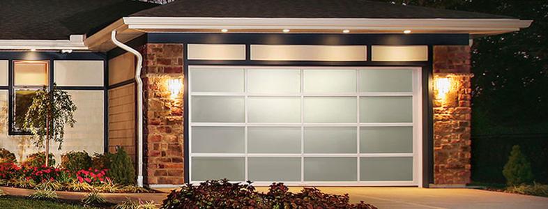 Modern steel garage door installed on contemporary home